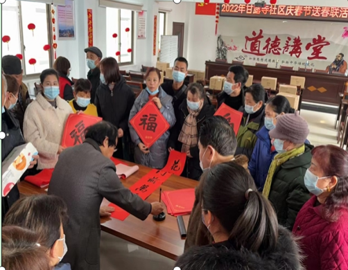 武陵区永安街道甘露寺社区开展“迎春送春联”活动