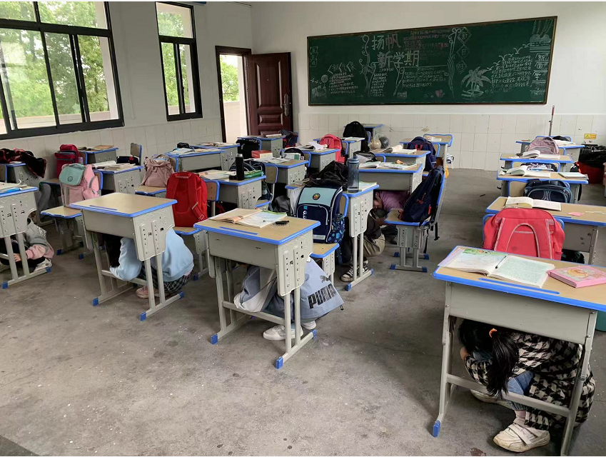丹洲乡太平小学开展防震减灾应急疏散演练活动