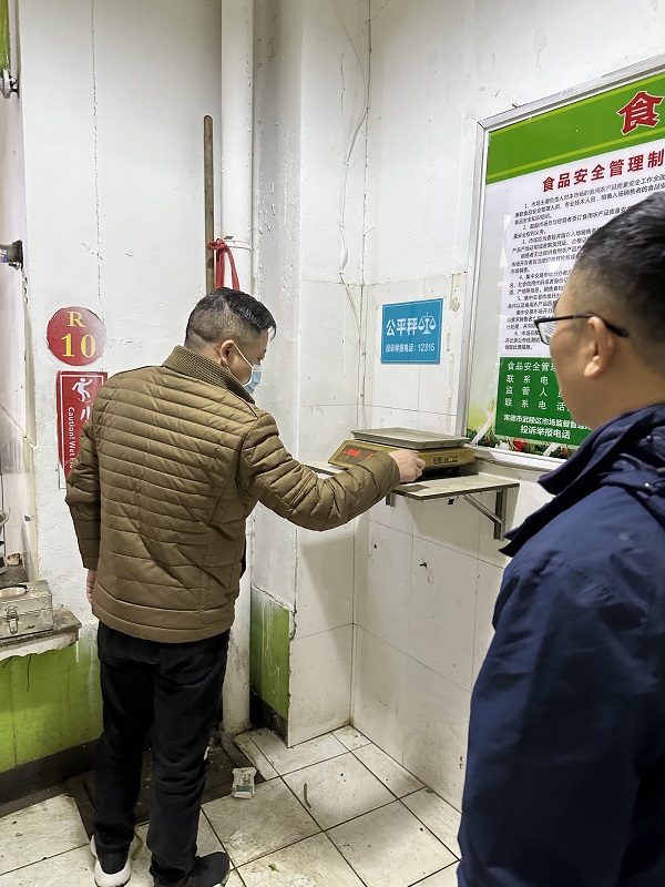 武陵区开展城区农贸市场免费计量检定工作