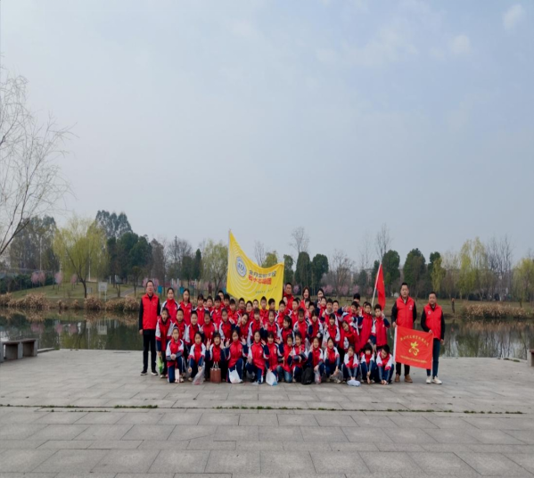 长庚街道高车社区联合金丹实验学校开展学雷锋志愿服务活动